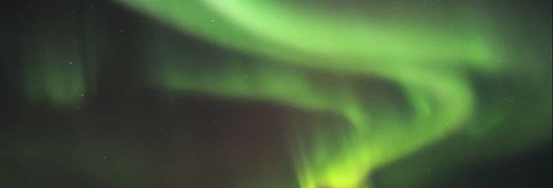 Billet Balade en motoneige sous l'aurore boréale