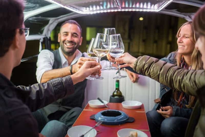 Billet Zurich : visite citadine en e-tuk-tuk, fondue au fromage suisse et vin