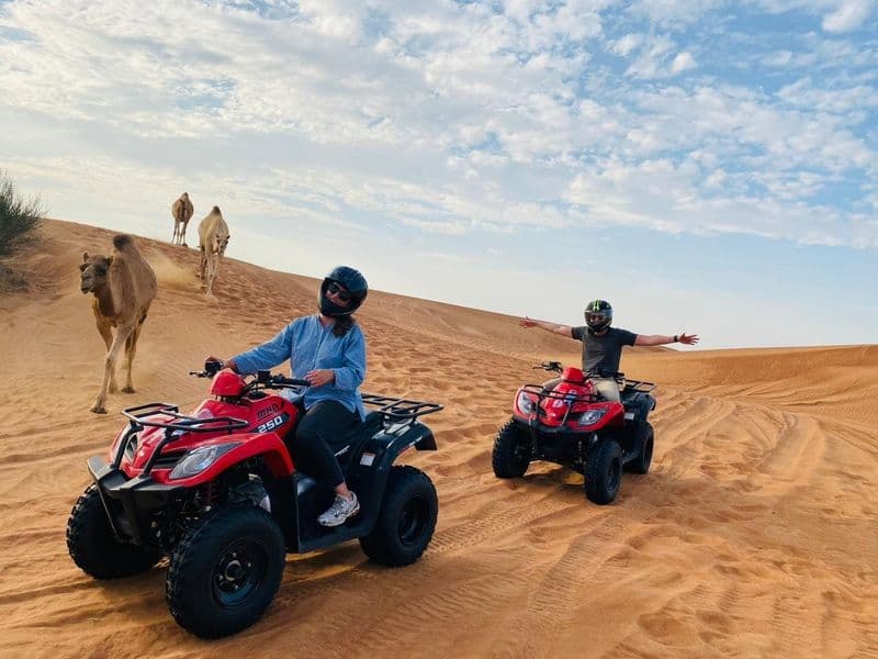 Billet Double quad ride in Dubai Desert with sandboarding, camel ride and BBQ